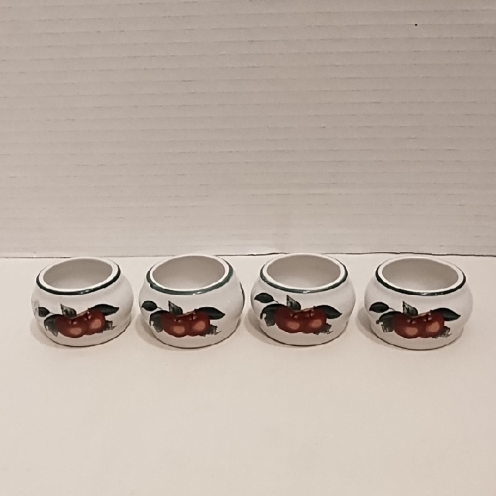 Set of 4 White Ceramic Napkin Rings with Red Apple Design